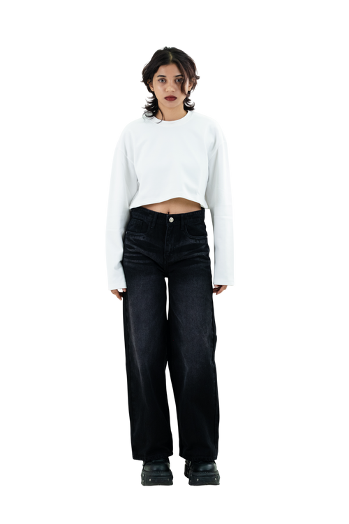 Model wearing black faded jeans by Colin Guest